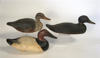 Appraisal: Three carved and painted decoys Including a blue bill Quebec