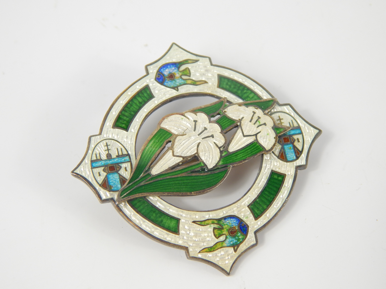 Appraisal: An Arts Crafts silver green and white guilloche enamel brooch