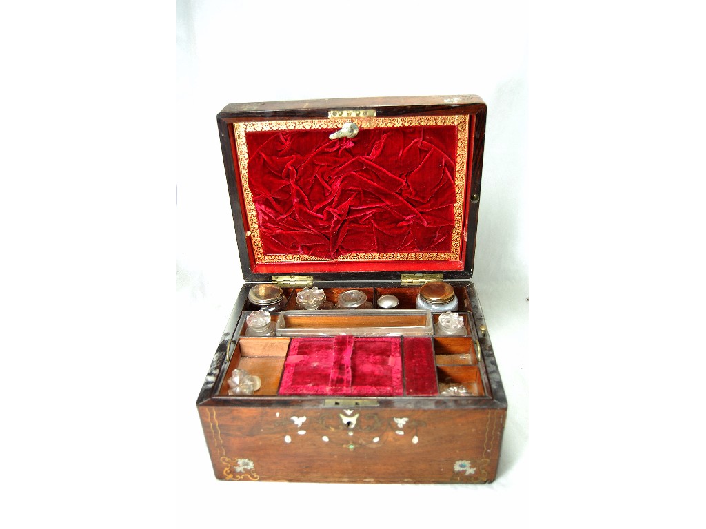 Appraisal: Victorian rosewood travelling toilet box the lid inlaid with parrots