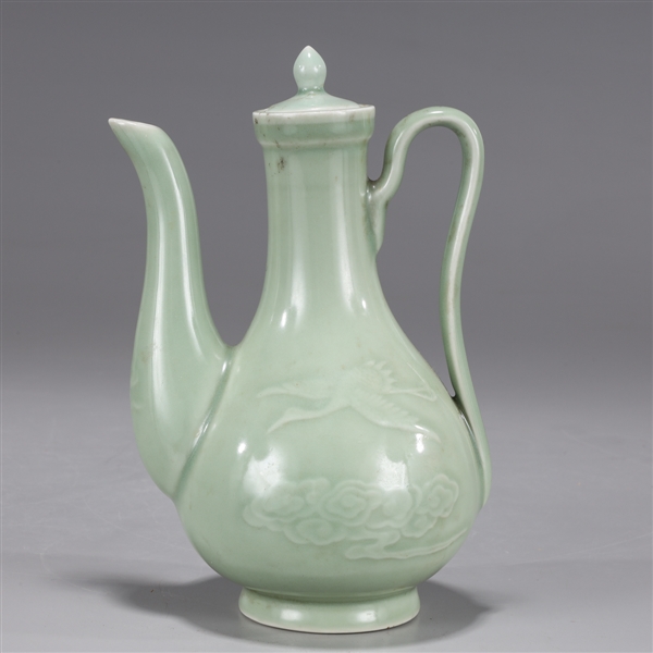 Appraisal: Chinese celadon glazed porcelain covered ewer body with birds in