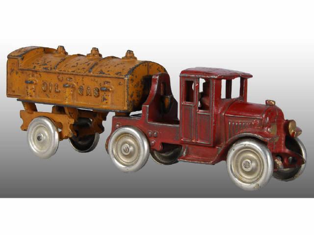 Appraisal: Cast Iron Kenton Tractor Trailer Toy Description Red cab with