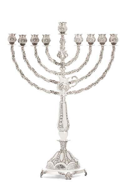 Appraisal: A sterling silver menorah A sterling silver menorah modern height