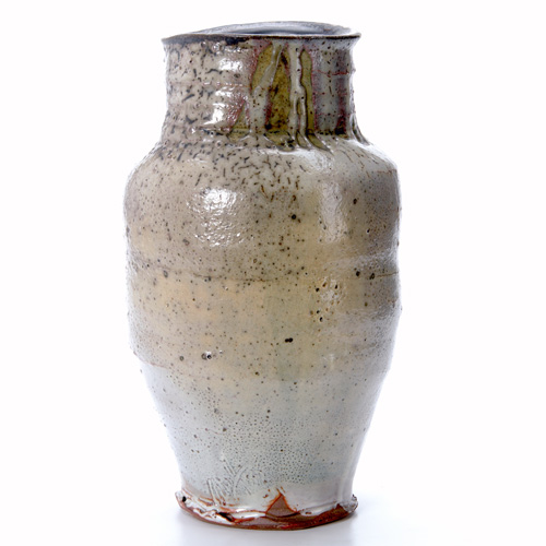 Appraisal: PAUL CHALEFF Stoneware baluster vase covered in dripping grey and