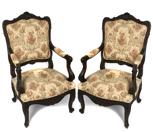 Appraisal: A pair of Louis XV style carved walnut and upholstered