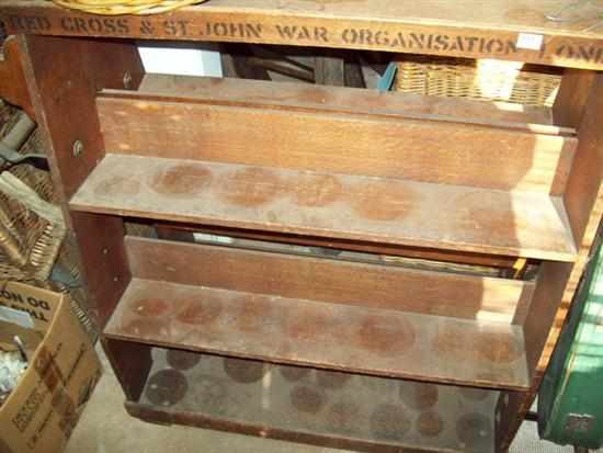 Appraisal: AN EDWARDIAN OAK THREE TIER BOOK SHELF RED CROSS AND