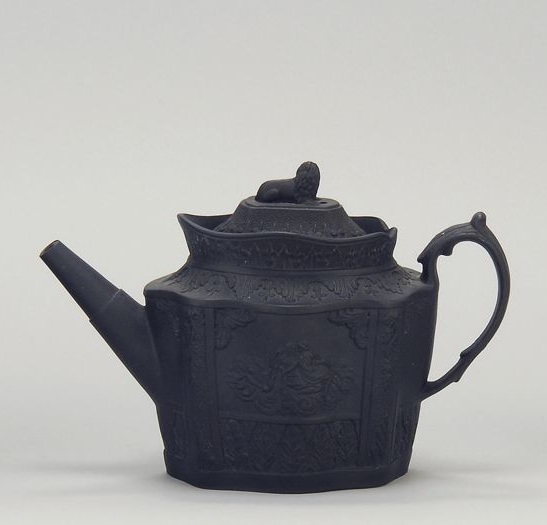 Appraisal: BASALT TEAPOT Circa Probably Coalport Raised allegorical scenes and acanthus