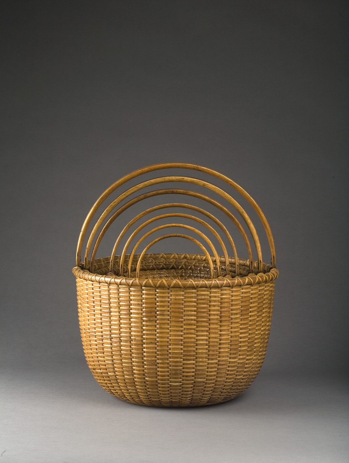 Appraisal: NEST OF SEVEN NANTUCKET BASKETS Of circular form each with