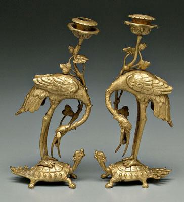 Appraisal: Pair Japanese bronze shokudai candle stands crane holding flowering branch