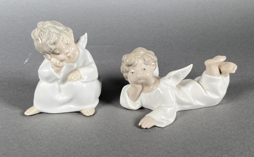 Appraisal: Two Lladro angel figurines for one money Reclining Angel measures