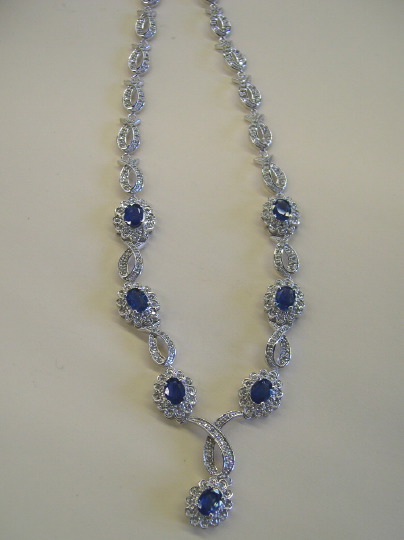 Appraisal: Elegant Fourteen-Karat White Gold Sapphire and Diamond Necklace composed of