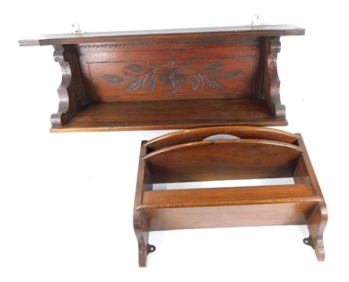 Appraisal: An early thC mahogany wall shelf with three bottle recesses