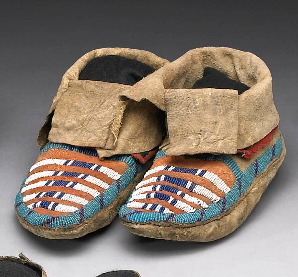 Appraisal: A pair of Crow beaded moccasins With thick soft soles