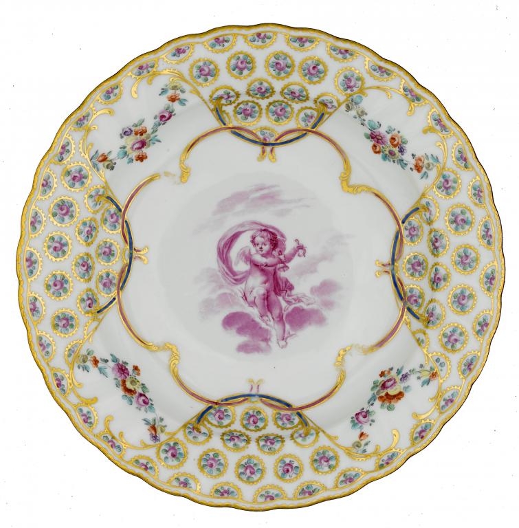 Appraisal: A DERBY FLUTED PLATE painted in bright carmine pink by