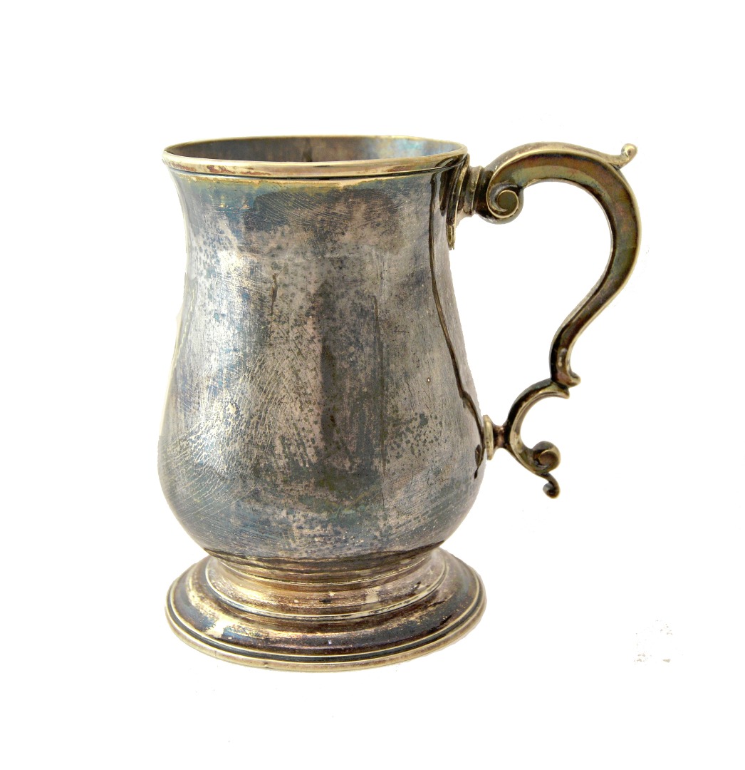 Appraisal: A George III silver mug of baluster form with a