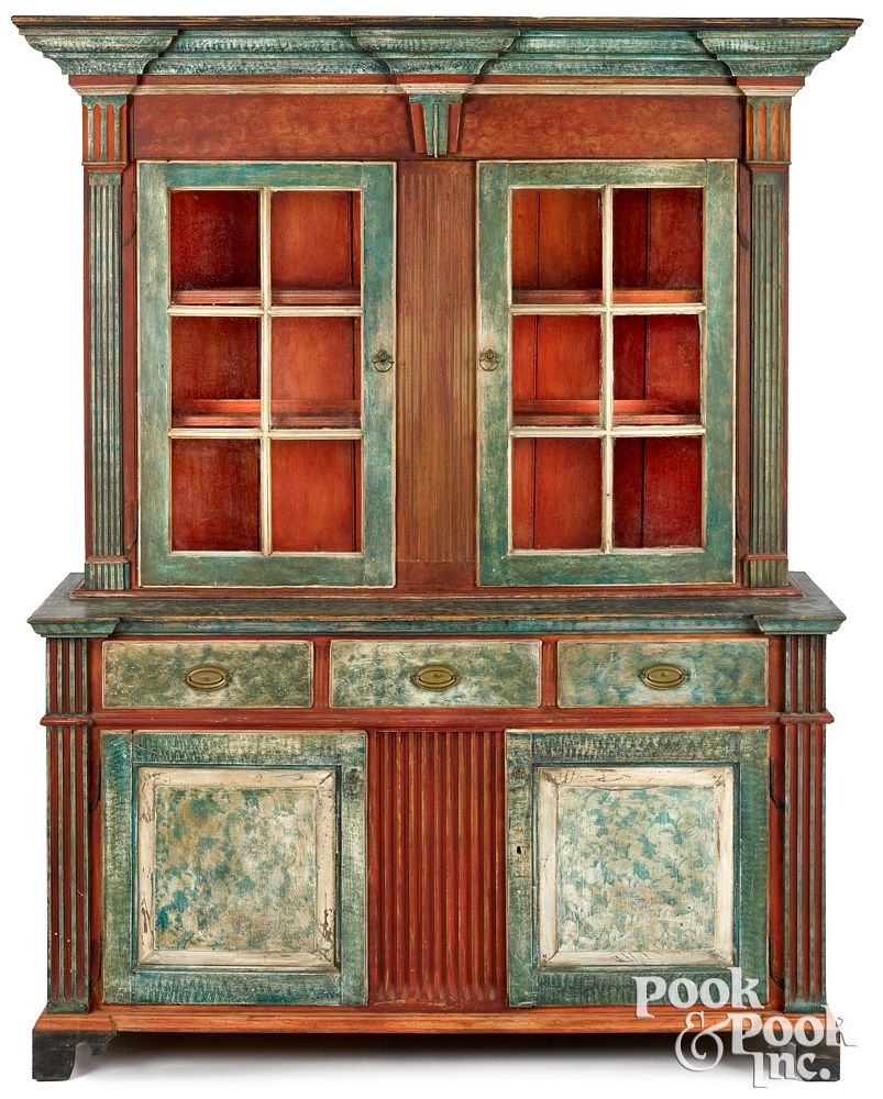 Appraisal: Pennsylvania painted architectural Dutch cupboard Pennsylvania painted pine two-part architectural