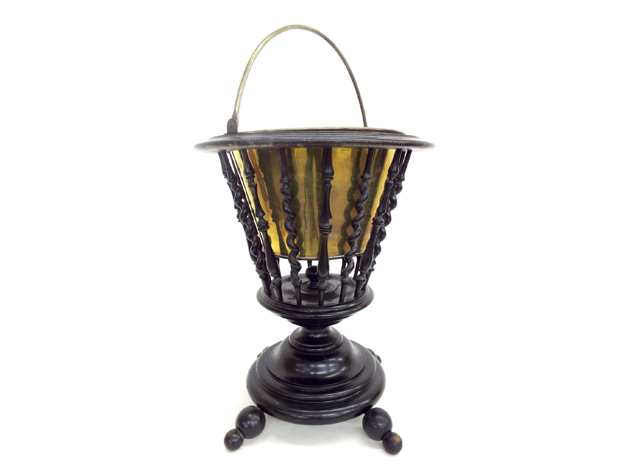 Appraisal: Continental ebonised wine bucket cooler fitted with a brass liner