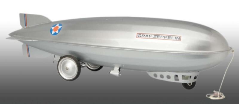 Appraisal: Pressed Steel Steelcraft Graft Zeppelin Toy Description Circa Total restoration