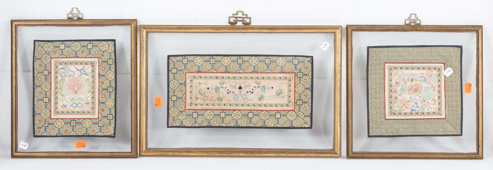 Appraisal: Three framed oriental textiles Undernumber