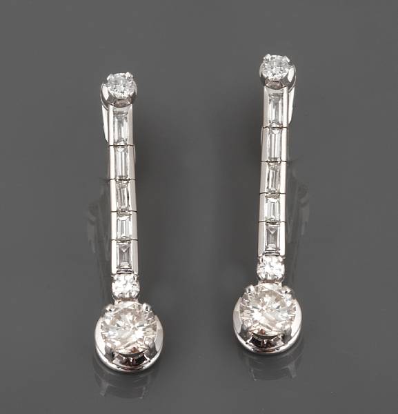 Appraisal: A pair of diamond and white gold dangle earrings estimated