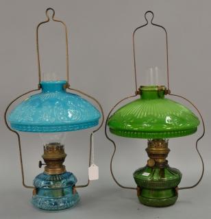 Appraisal: Two hanging oil lamps with case glass shades one blue