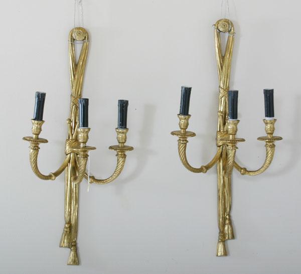 Appraisal: Pair dore' bronze wall tassel wall sconces three-light engraved arms