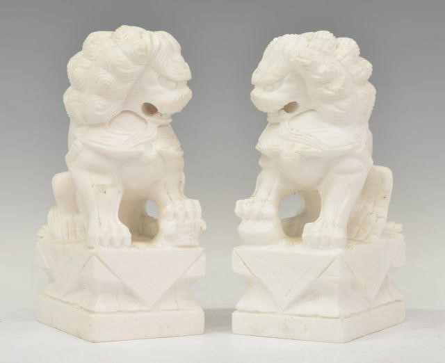 Appraisal: lot of Chinese white marble bookends carved in the form