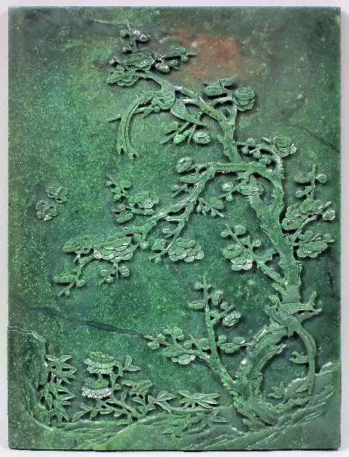 Appraisal: A large Chinese spinach green jade panel carved in bold