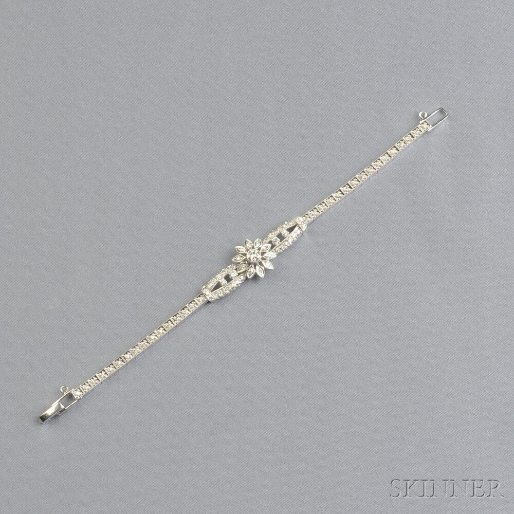 Appraisal: kt White Gold and Diamond Bracelet the central flower motif