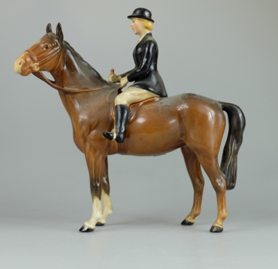 Appraisal: Beswick Huntswoman on brown horse