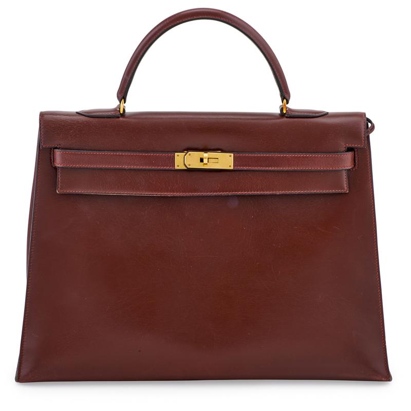 Appraisal: HERMES CM ROUGE H BOX CALF LEATHER KELLY BAG Gold