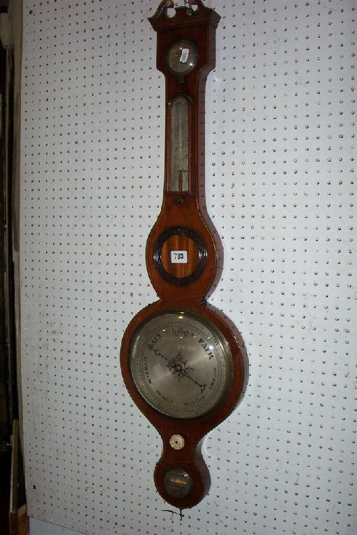 Appraisal: A Georgian mahogany wheel barometer with string inlaid detail and