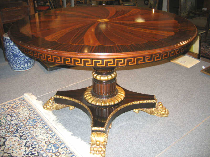 Appraisal: CONTINENTAL CIRCULAR CENTER TABLE Circular top made of an assortment