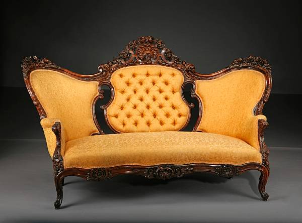 Appraisal: A Rococo Revival carved rosewood sofa and three chairs mid