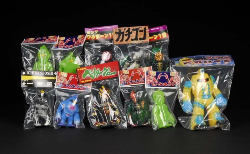 Appraisal: Lot of Vinyl Figures Description Japanese Real x Head Condition