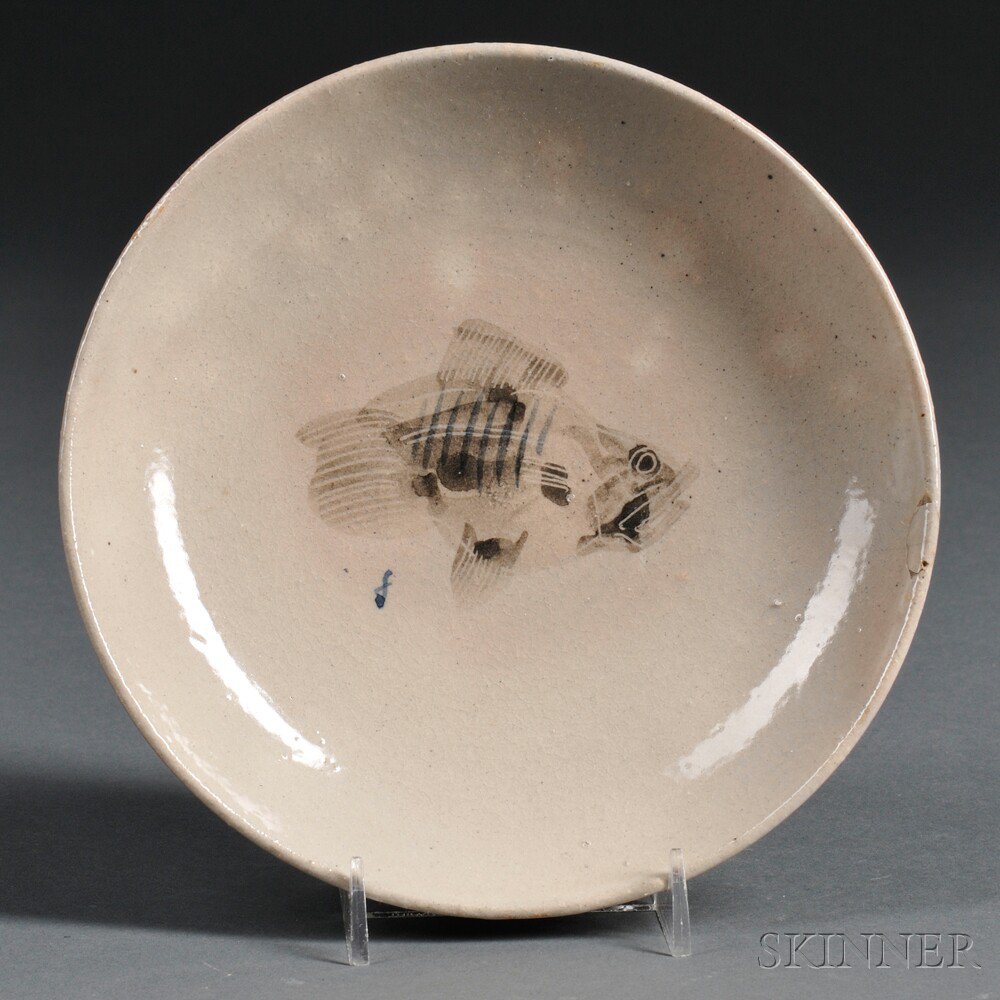 Appraisal: Earthenware Fish-decorated Dish Japan th century glazed in two tones