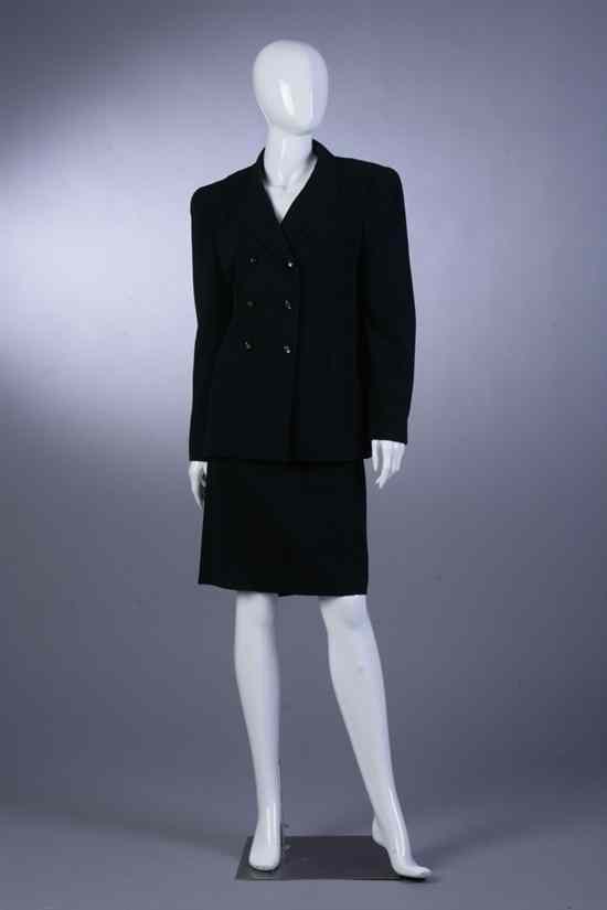 Appraisal: CHANEL BLACK WOOL SUIT Spring size The double-breasted jacket with