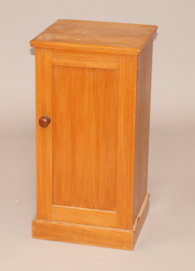 Appraisal: A late Victorian walnut pot cupboard with single panelled door