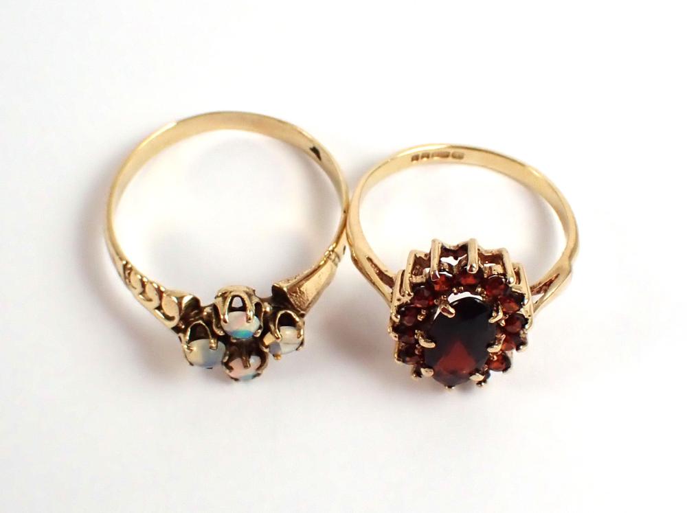 Appraisal: TWO GEMSTONE AND YELLOW GOLD RINGS including a k gold