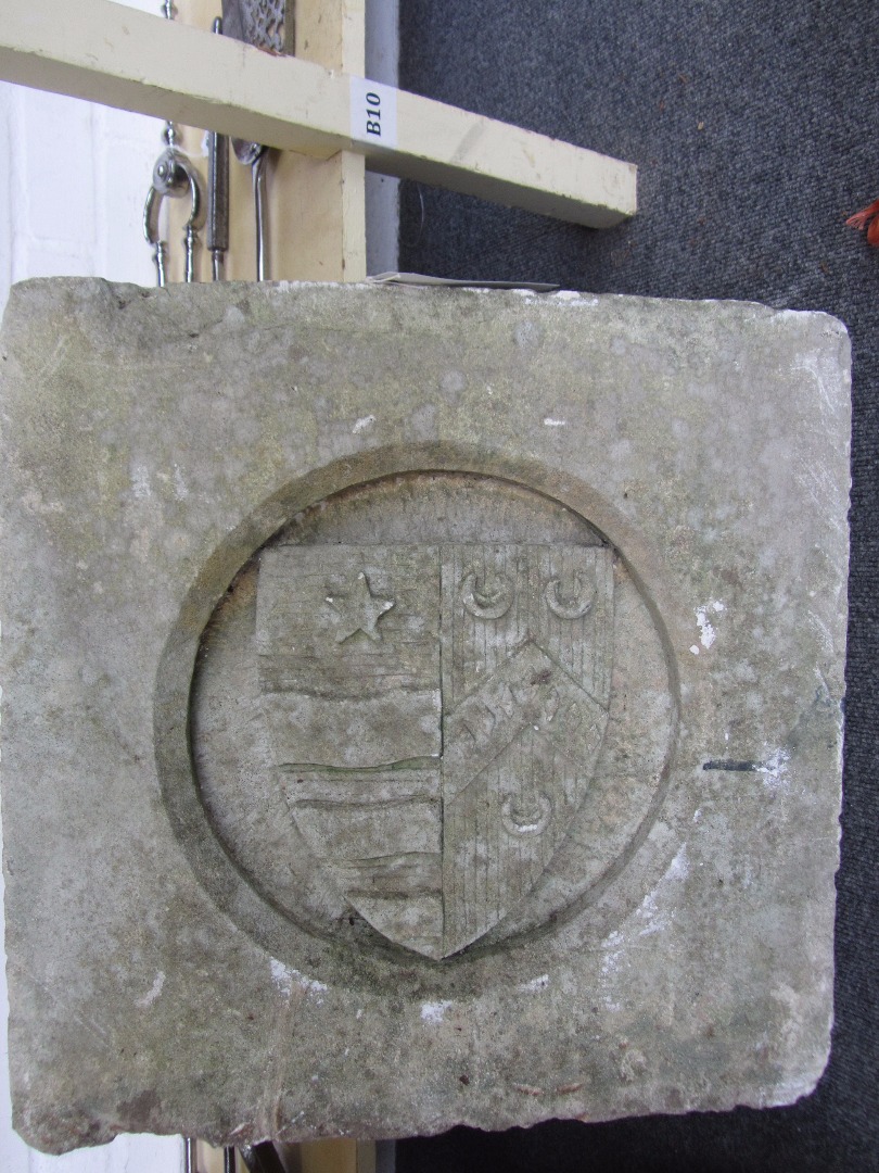 Appraisal: Two reconstituted stone armorial plaques each of square section one