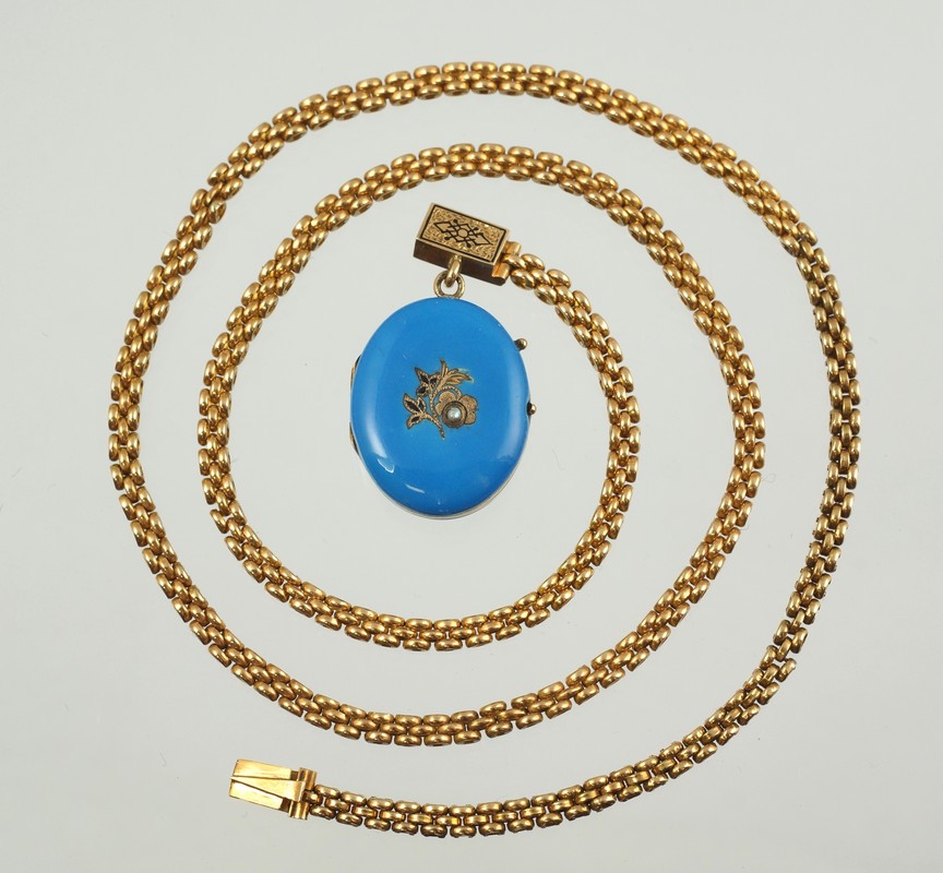 Appraisal: Unmarked YG chain with blue enameled locket tests K chain