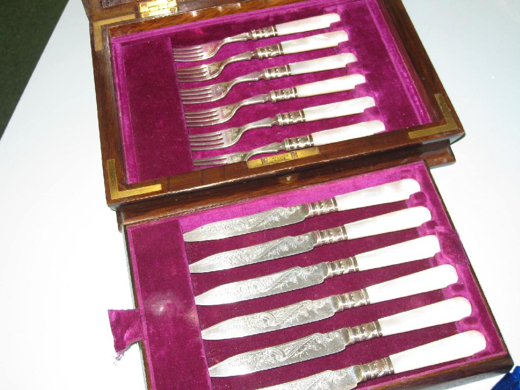 Appraisal: Six George V Dessert Knives and Forks with engraved blades