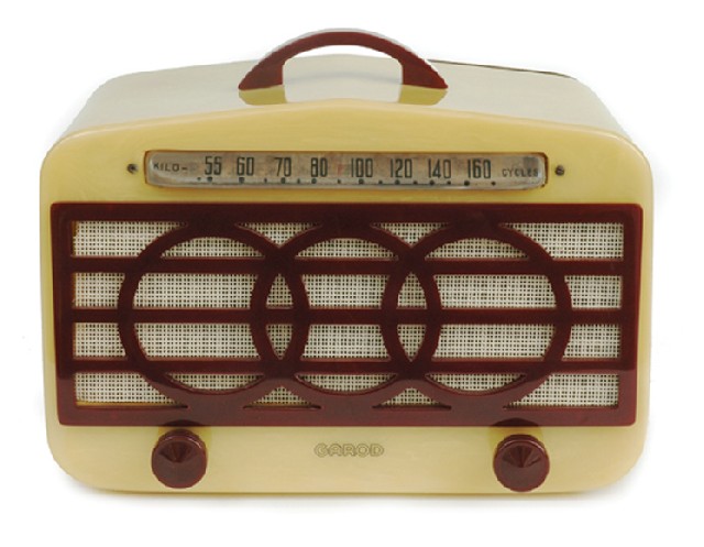 Appraisal: Garod circa white case with maroon handle circular grille cm