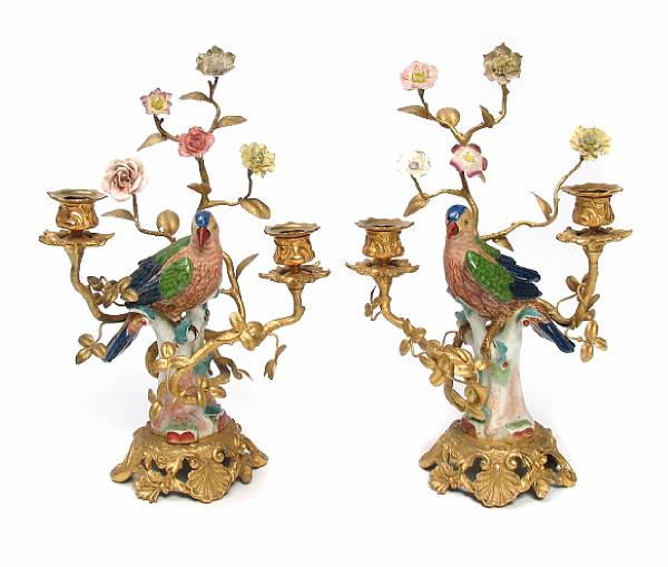 Appraisal: A pair of gilt bronze and porcelain two light candelabra