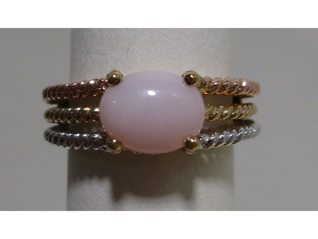 Appraisal: Nine carat tri colour gold rose quartz single stone ring