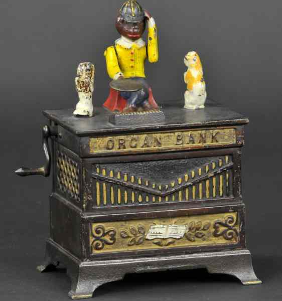 Appraisal: ORGAN BANK CAT DOG MECHANICAL BANK Yellow jacket Kyser Rex