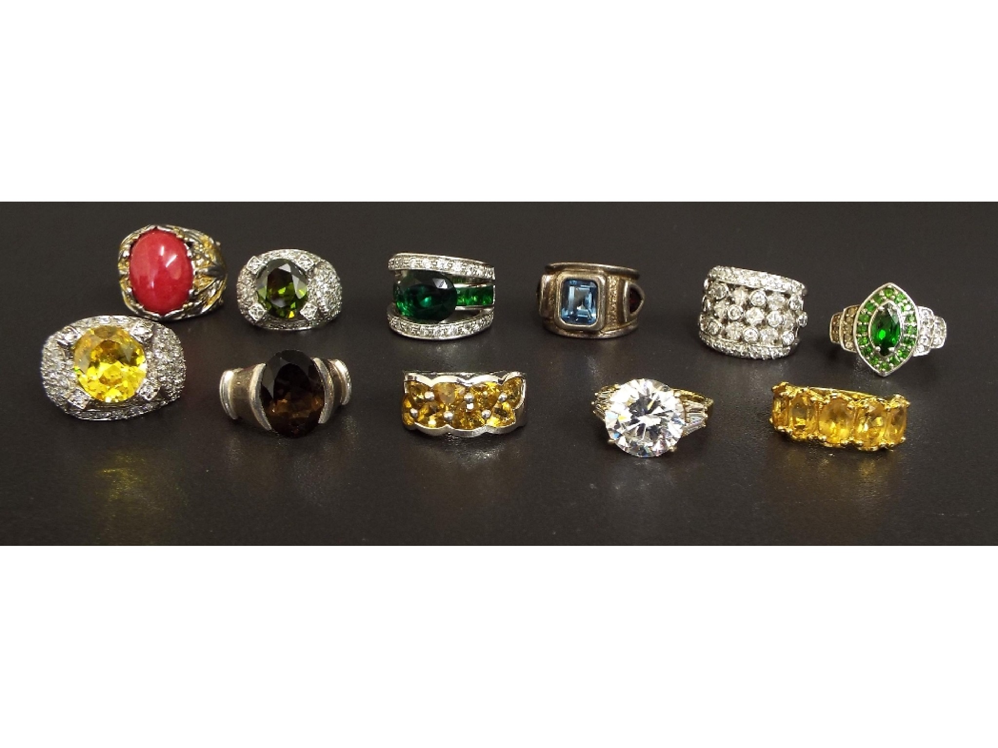 Appraisal: Collection of eleven silver and gilt stone set dress rings