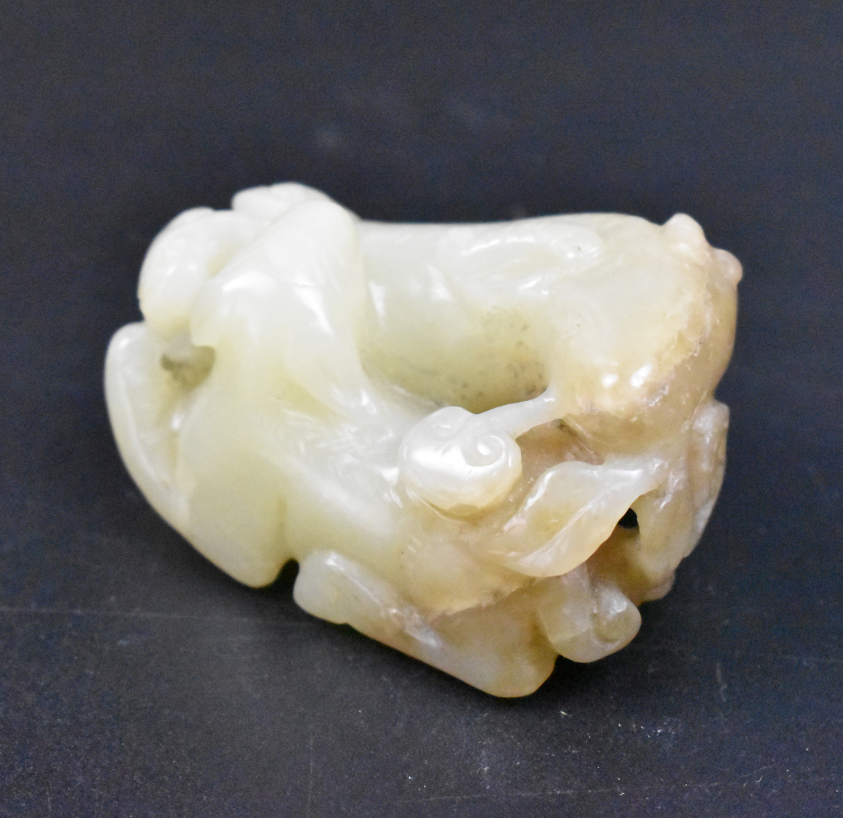 Appraisal: Chinese yellow jade carved ram toggle dating from the Qing