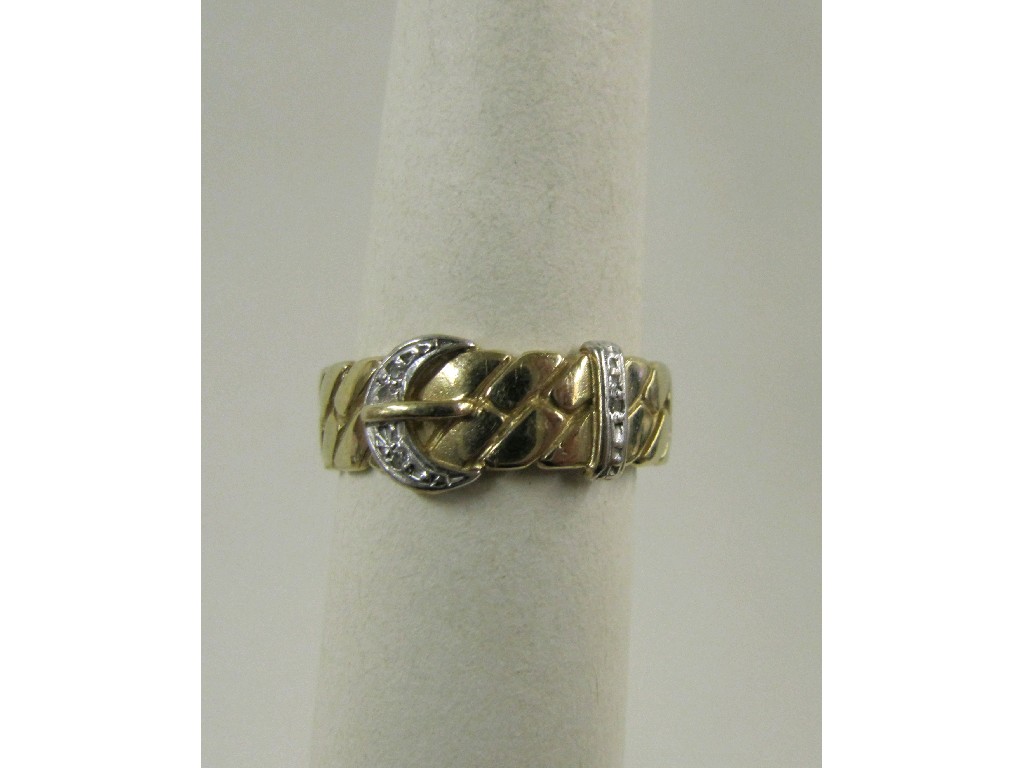 Appraisal: Nine carat gold diamond set buckle ring Ring size R