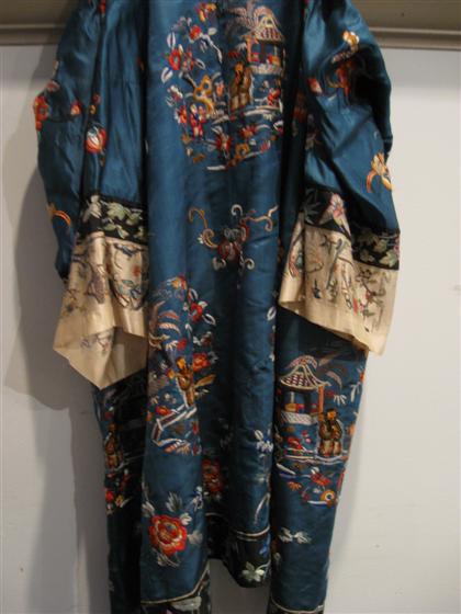 Appraisal: Chinese silk embroidered robe early th century Of unlined blue