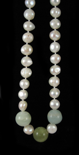 Appraisal: OPERA LENGTH HARDSTONE AND BAROQUE PEARL NECKLACE measuring inches in